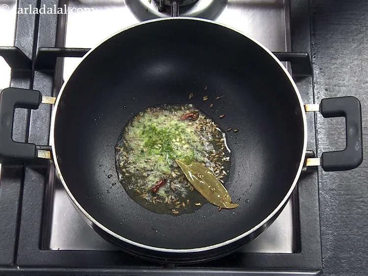 Step 33 – Add 1 tsp&nbsp;finely&nbsp;<a href="https://www.tarladalal.com/glossary-chopped-green-chilli-820i">chopped green chillies</a>.&nbsp;Antioxidant&nbsp;<a href="https://www.tarladalal.com/recipes-for-Juices-Rich-in-Vitamin-C-805" target="_blank">vitamin C</a>&nbsp;in&nbsp;<a href="http://www.tarladalal.com/recipes-using-green-chillies-331">green chillies</a>&nbsp;protects the body from effects …