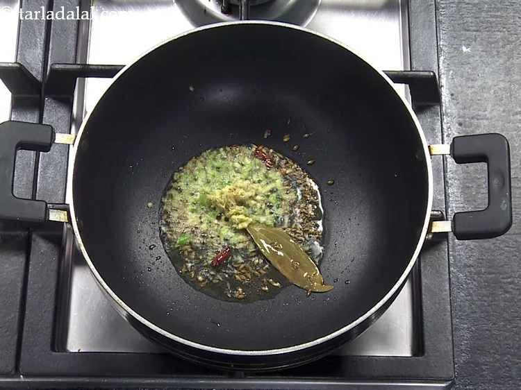 Step 34 – Add 1/4 tsp&nbsp;<a href="https://www.tarladalal.com/glossary-grated-ginger-943i">grated ginger (adrak)</a>.&nbsp;<a href="https://www.tarladalal.com/recipes-using-ginger-453">Ginger</a>&nbsp;is an effective cure for congestion,&nbsp;<a href="https://www.tarladalal.com/recipes-for-Home-Remedies-for-sore-throat-throat-pain-474">sore throat</a>,&nbsp;<a href="http://www.tarladalal.com/recipes-for-Home-Remedies-for-Cough-Colds-467">cold …