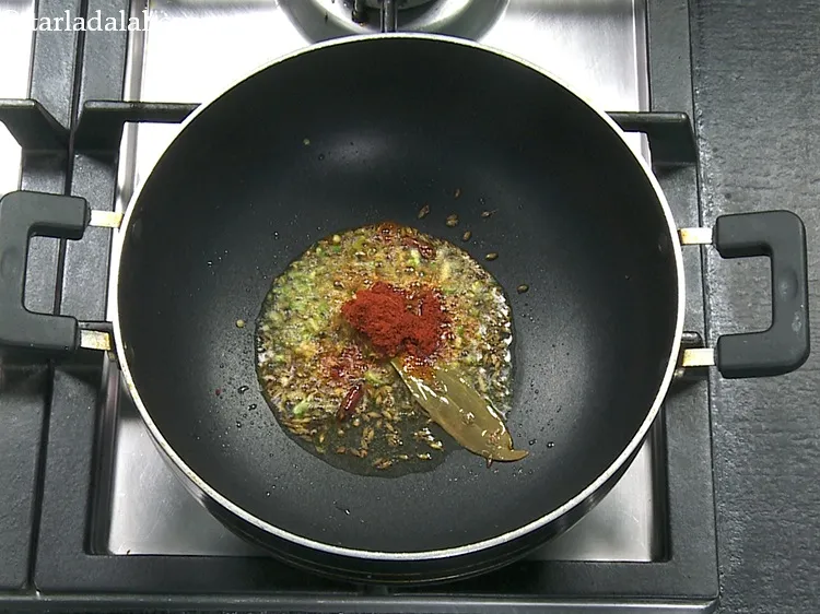 Step 36 – Add 1 tsp&nbsp;<a href="https://www.tarladalal.com/glossary-chilli-powder-red-chilli-powder-339i">chilli powder</a>..