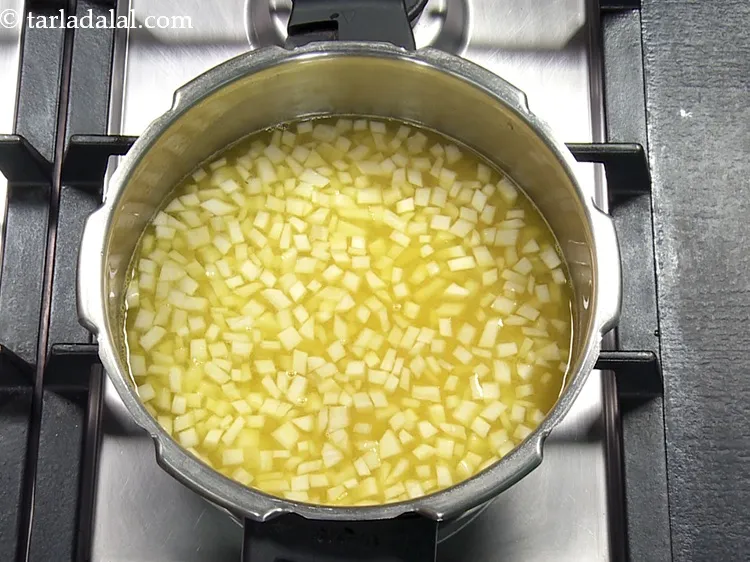 Step 26 – Mix well and pressure cook for 3 whistles. Allow the steam to escape before opening …