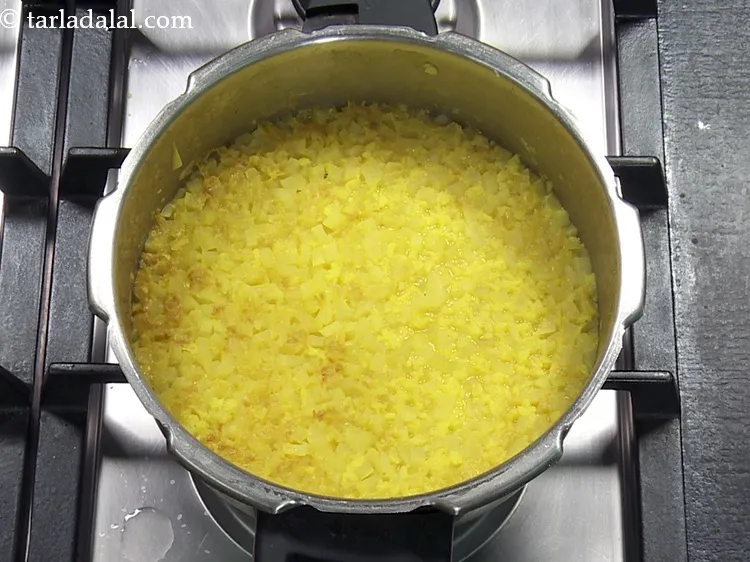 Step 27 – This is how the yellow moong dal looks after pressure cooking. Keep aside.&nbsp;