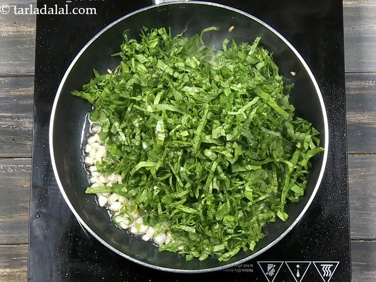Step 11 – Add the radish leaves. Use only the fresh and green leaves, do not use the …