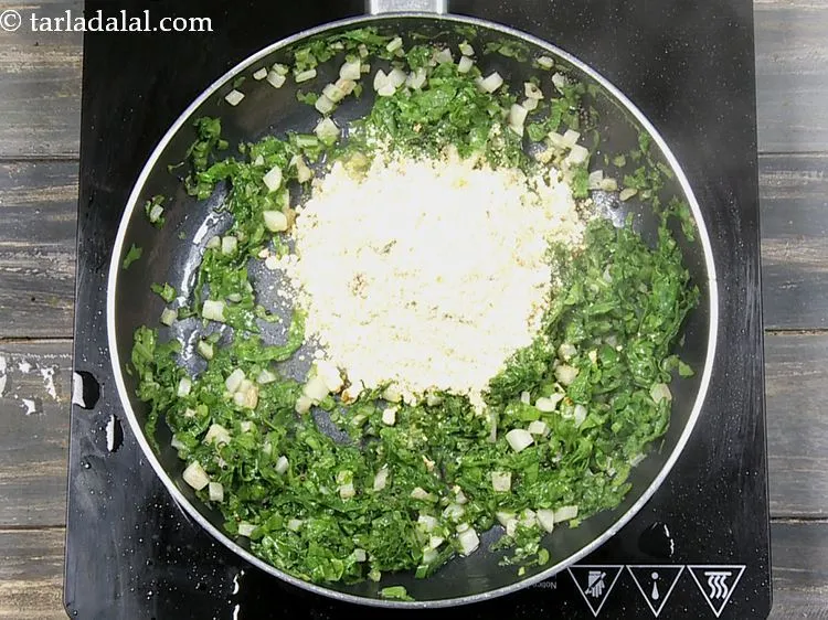 Step 18 – Sprinkle the besan mixture evenly over&nbsp;mooli ki sabji. Besan will absorb all the moisture and …