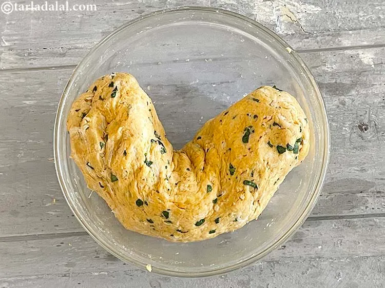 Step 22 – Roll the dough into cylinderical shape. This makes it easier to make the dough balls …