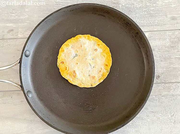 Step 30 – Brush the partially cooked side with oil.