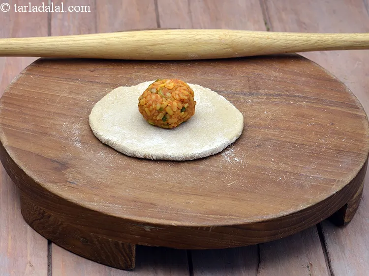 Step 26 – Place one portion of the stuffing in the centre of the circle.