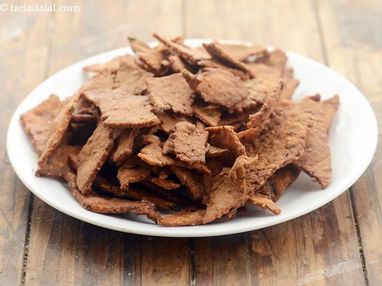 Step 27 – Remove <strong>moong dal crispies</strong> on a plate. Do not drain on an absorbent paper as …