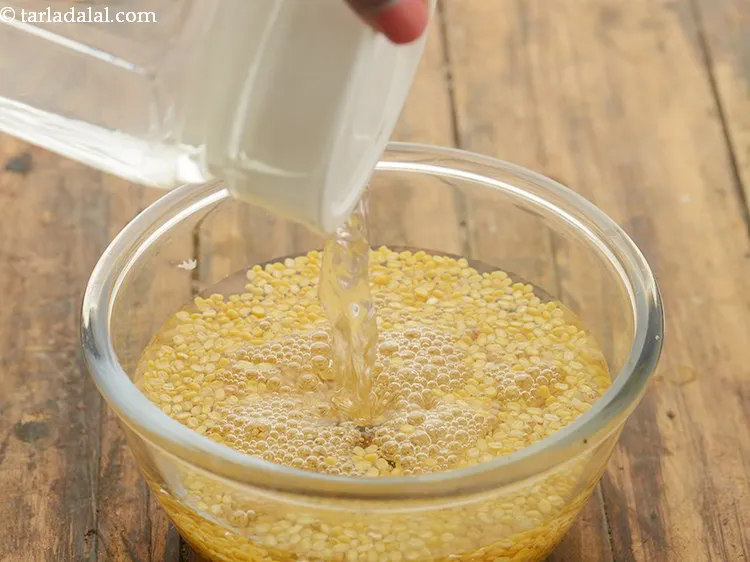 Step 3 – Wash the dal and transfer to a deep bowl.