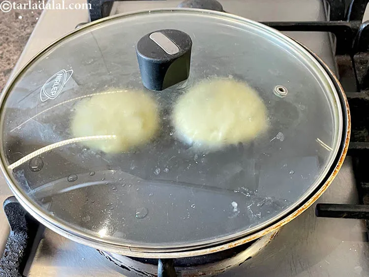 Step 28 – Cover with a lid and cook on a slow flame for 2 to 3 minutes.