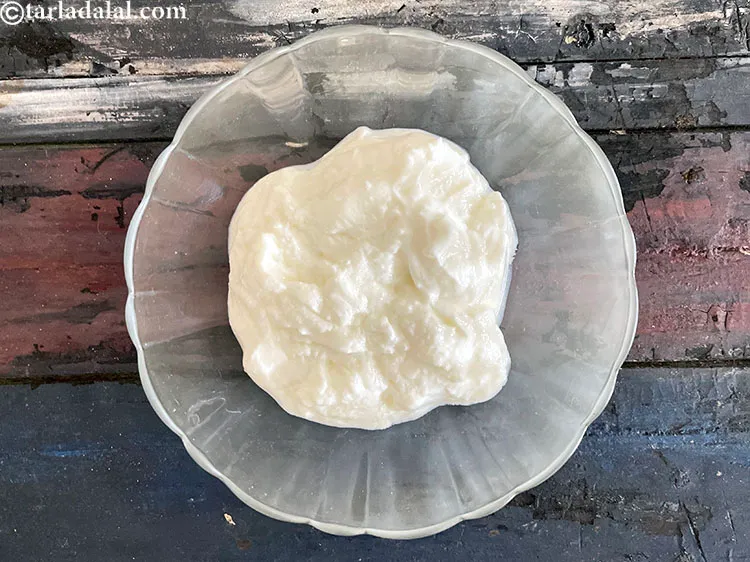 Step 37 – In a bowl put&nbsp;<meta charset="UTF-8" />4 cups&nbsp;<a href="glossary-low-fat-curds-low-cal-dahi-low-calorie-curd-low-fat-yogurt-1107i">low fat curds (dahi)</a>.