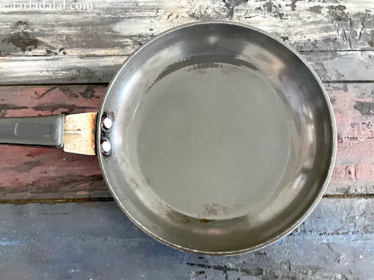 Step 40 – Heat the oil in a small non-stick pan.