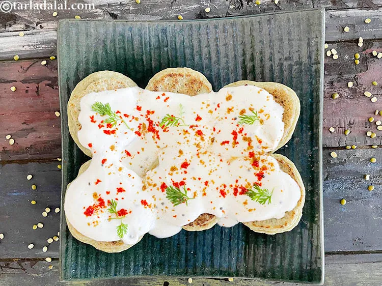 Step 43 – <meta charset="UTF-8" /> As a variation, you can also try <a href="https://www.tarladalal.com/moong-dal-dahi-vada-1387r">moong dal dahi vada</a>.&nbsp;<br …