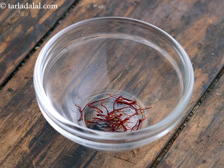 Step 6 – Take saffron strands in a small bowl.