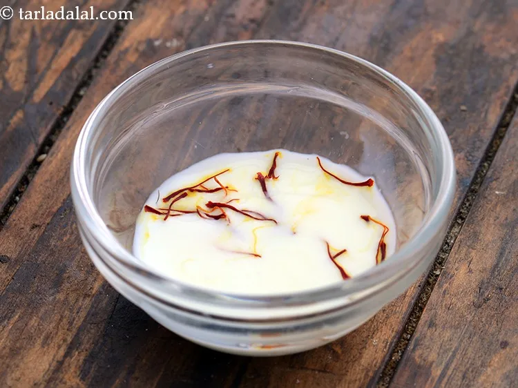 Step 7 – Add 1 tablespoon of warm milk, mix and keep aside.