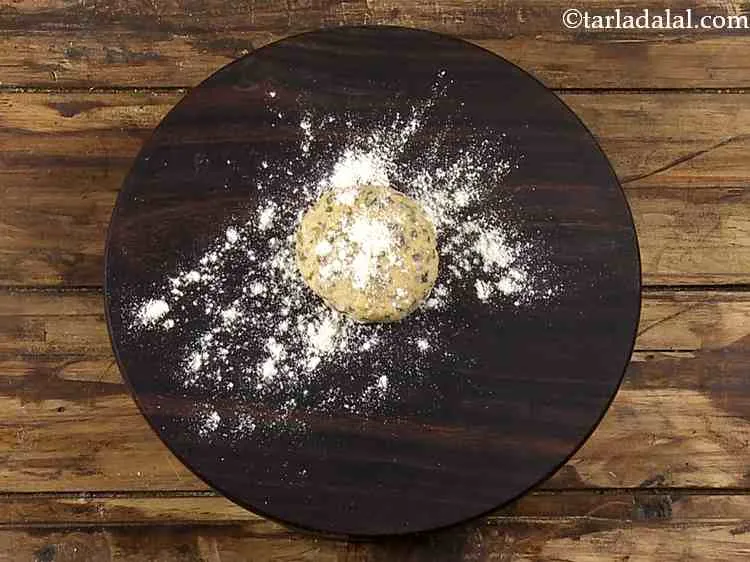 Step 17 – <html> <head> <title></title> </head> <body> <p> Dip one portion of the dough in flour, shake …