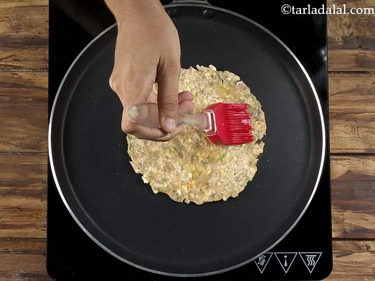 Step 20 – <html> <head> <title></title> </head> <body> <p> Once half cooked, flip it over and grease with …