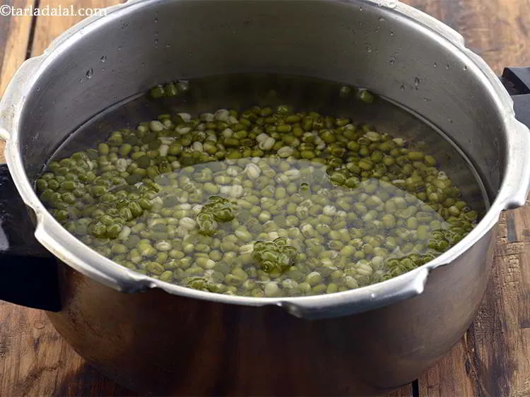 Step 7 – Add the moong to the pressure cooker.