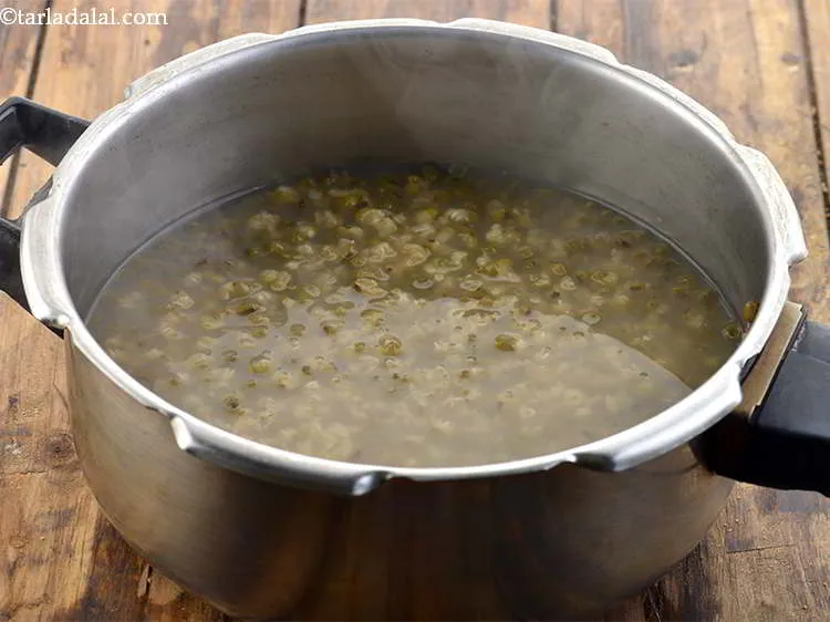 Step 8 – Pressure cook the moong for 3 whistles. Allow the steam to escape naturally before opening …
