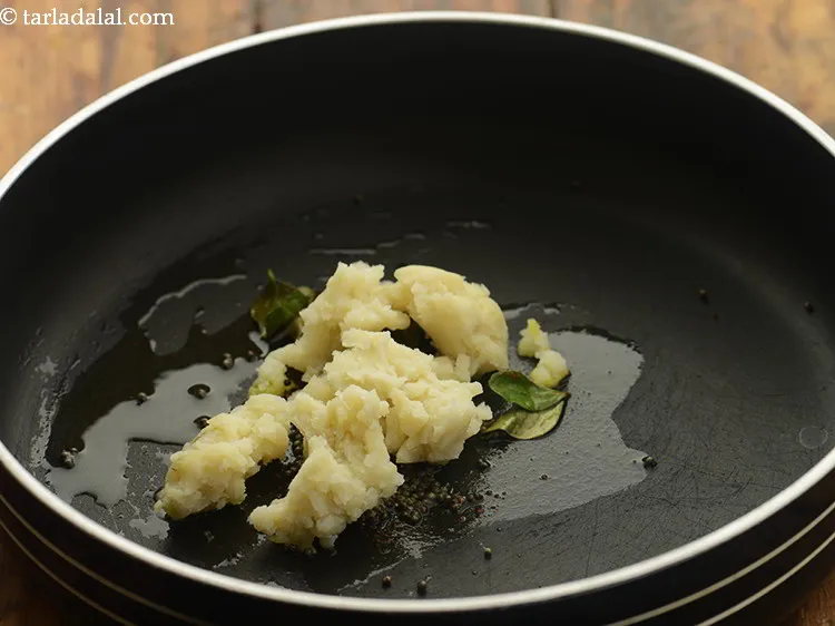 Step 21 – Add the potatoes. They have been boiled, peeled and mashed.