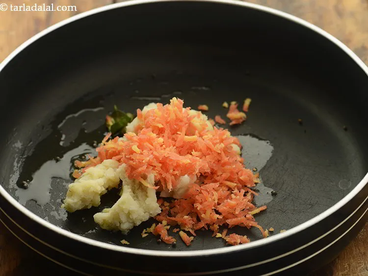 Step 22 – Add grated carrots.