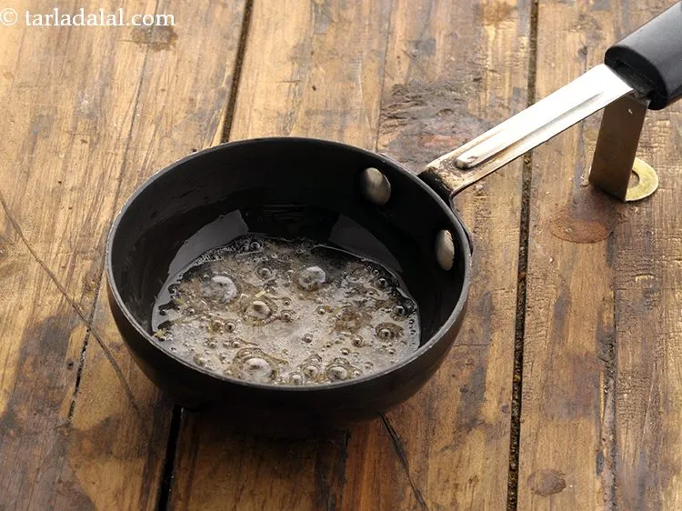 Step 21 – Once the oil is hot, add mustard seeds and cumin seeds.