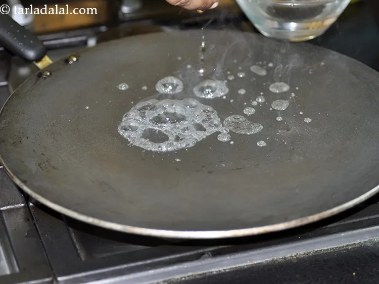 Step 30 – Sprinkle a little water on it. It should sizzle immediately.