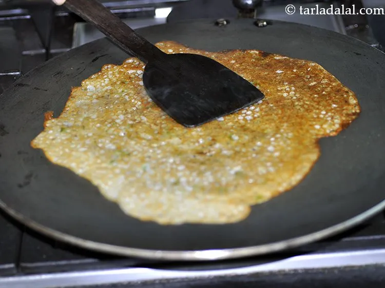 Step 35 – Cook on a medium flame till the dosa turns golden brown in colour and crisp …