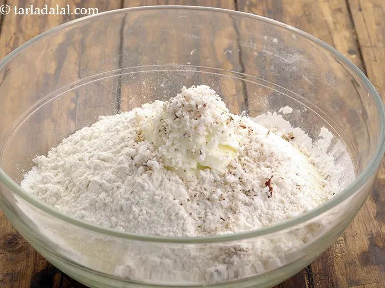 Step 15 – Add coconut. This is totally optional but it gives an authentic <a href="https://www.tarladalal.com/recipes-for-veg-recipes-south-indian-44" target="_blank">South-Indian</a> touch.