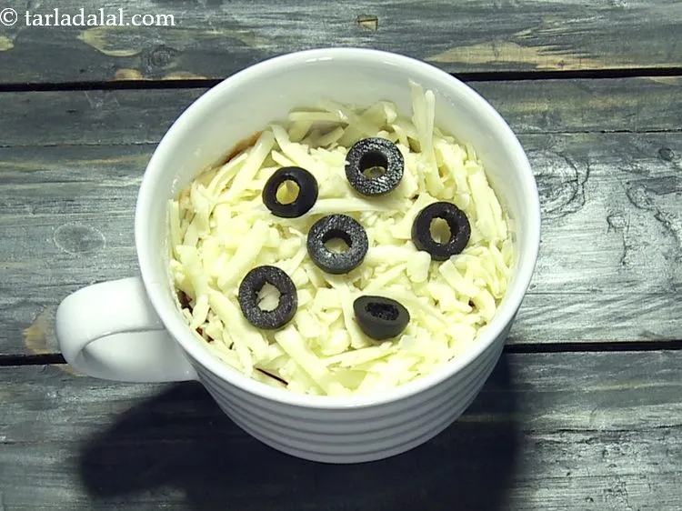 Step 13 – Finally place 6 olives over it.&nbsp;