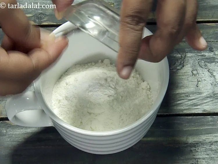 Step 3 – To this add 1/8 tsp baking powder.&nbsp;