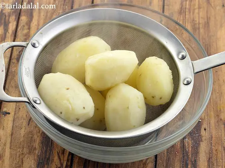 Step 6 – Parboil the potatoes for about 22-25 minutes. We are parboiling the potatoes so that they …