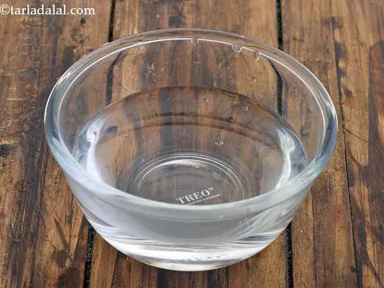 Step 22 – Take a small bowl and fill it up with hot water.