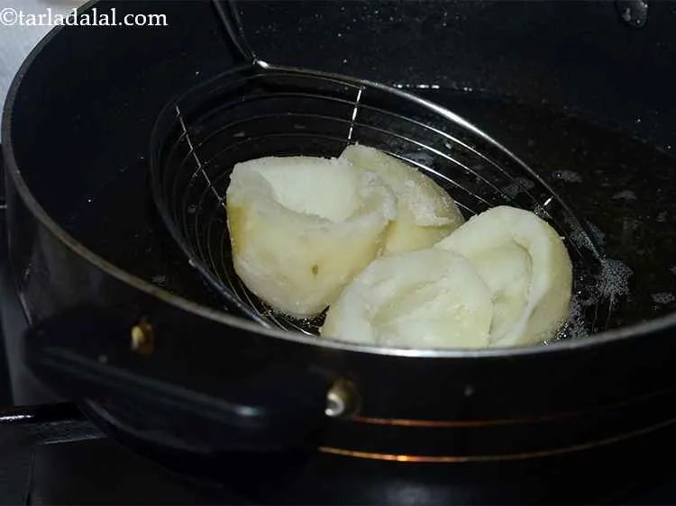 Step 11 – Take a deep non-stick pan and fill it up with the oil for frying. You …