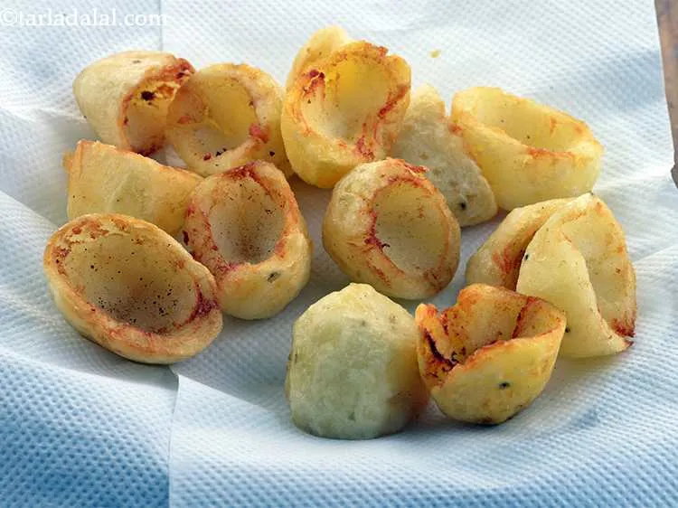 Step 12 – Remove and drain on an absorbent paper and keep aside to cool slightly.&nbsp;