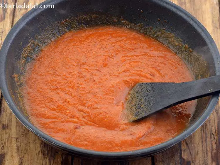 Step 40 – Add the freshly prepared tomato pur&eacute;e and salt &amp; mix well. You can refer our …