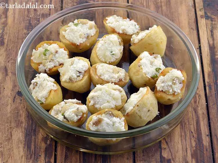 Step 45 – Just before serving, arrange the stuffed potatoes in a serving dish.