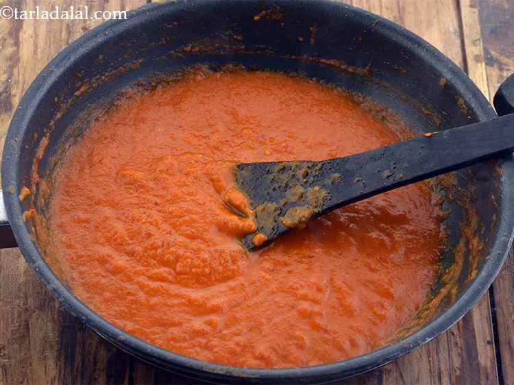 Step 41 – Simmer the mixture for 5 to 7 minutes till the tomato puree gets cooked.