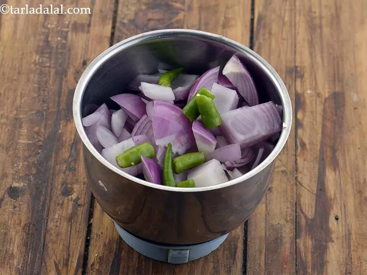 Step 28 – Now add the green chilies.