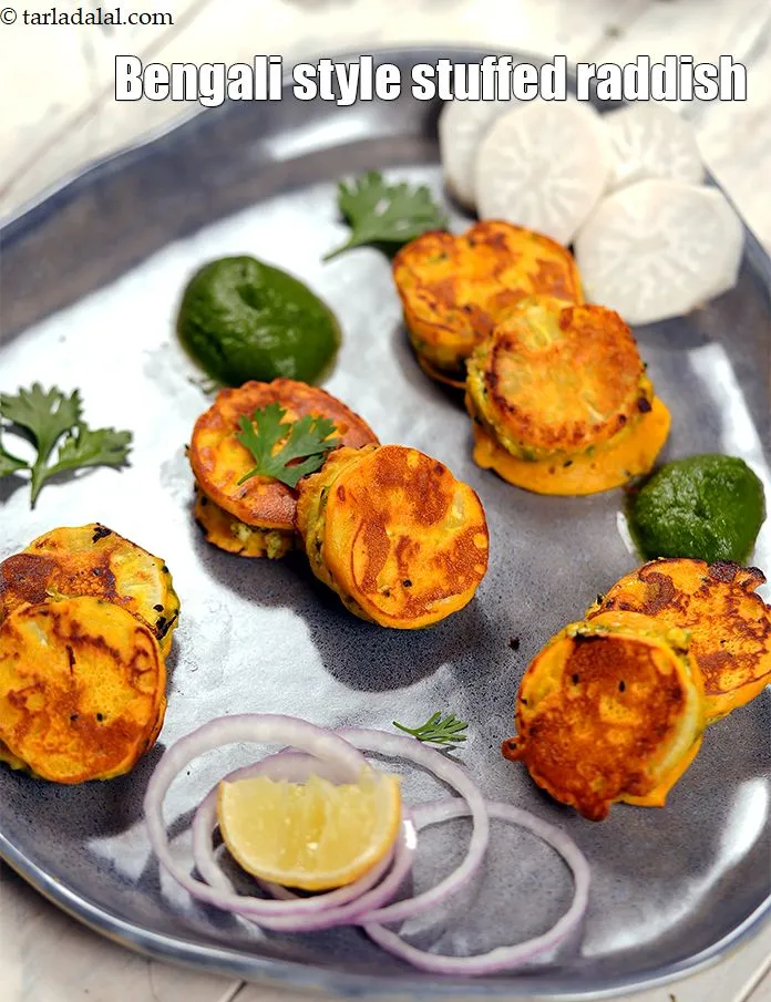 Step 33 – Serve <strong>mulo pur | &nbsp;Bengali style stuffed radish | stuffed radish bhajia |</strong> immediately.&nbsp;