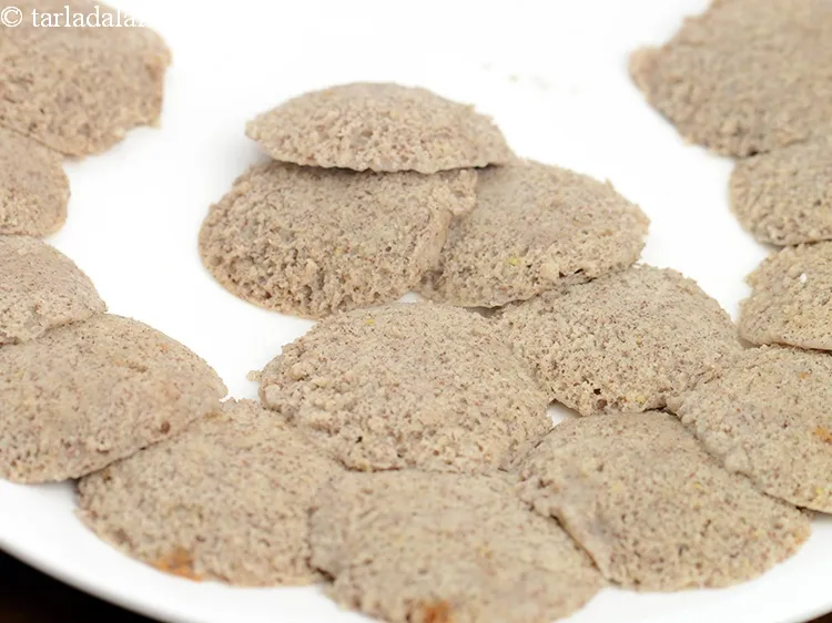 Step 52 – Repeat with the remaining batter to make more idlis.