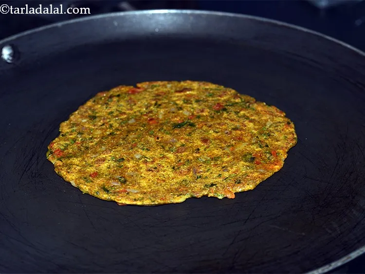 Step 26 – Cook it till it turns golden brown in colour from both the sides.