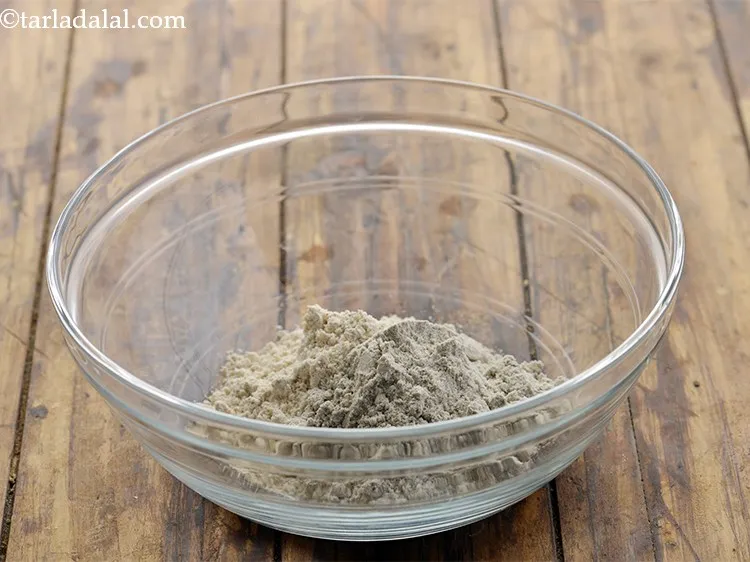 Step 3 – Next add the bajra flour. Bajra flour helps in lowering <a href="https://www.tarladalal.com/recipes-for-Low-Cholesterol--380" target="_blank">cholesterol</a> and <a …