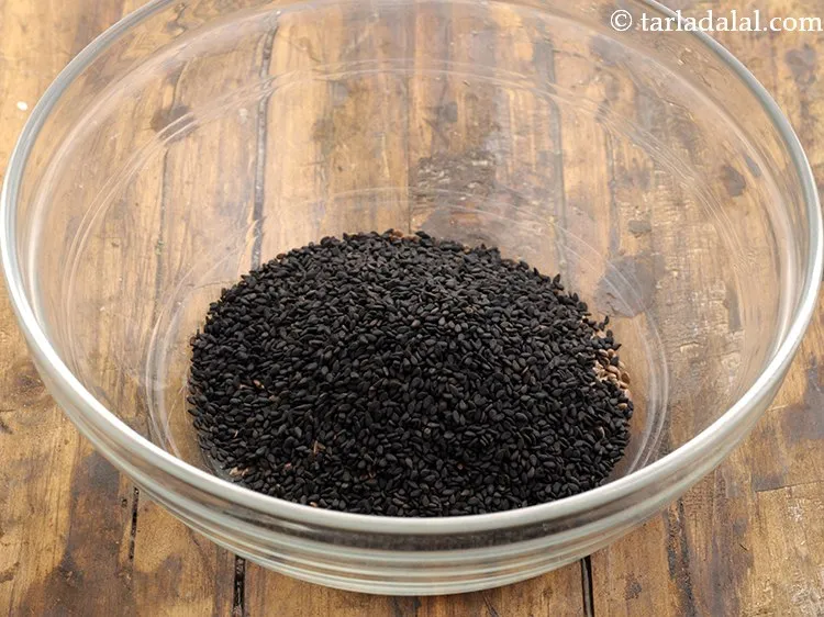 Step 8 – Add black sesame seeds to it. These lend a unique flavour to the mukhwas.&nbsp;