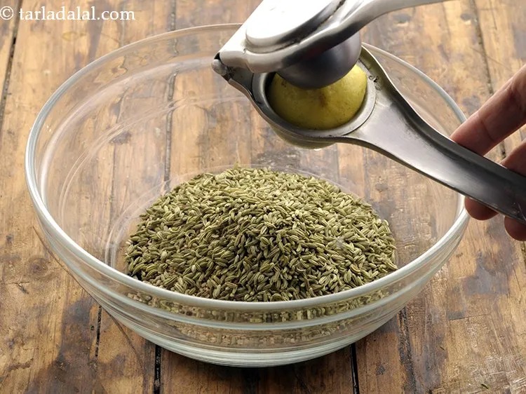 Step 11 – Add the lemon juice to make <strong>4 seed healthy mukhwas</strong>.&nbsp;This helps to maintain the crunchiness …