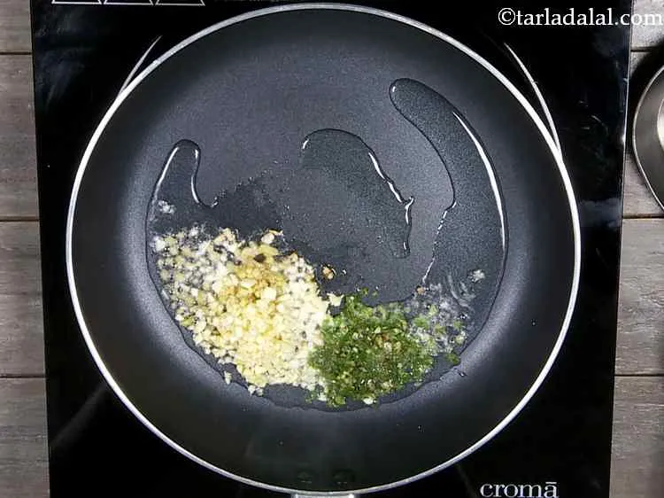 Step 25 – Now add the garlic and green chilli. They are the most essential ingredients of Chinese …