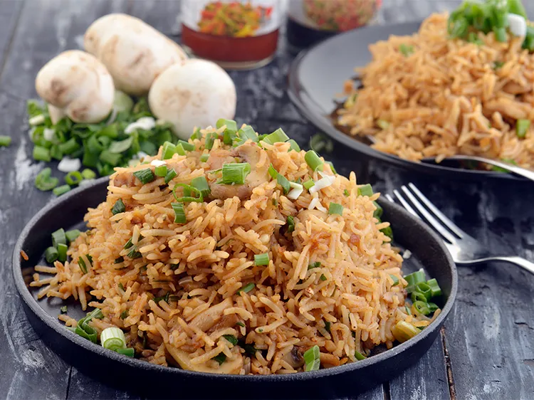 Step 34 – Serve the mushroom fried rice immediately with tongue-tickling preparations like <a href="/Chinese-Fried-Paneer-in-Hot-and-Sweet-Sauce-Kapi-Cho-Paneer-4769r">Chinese Fried Paneer in …