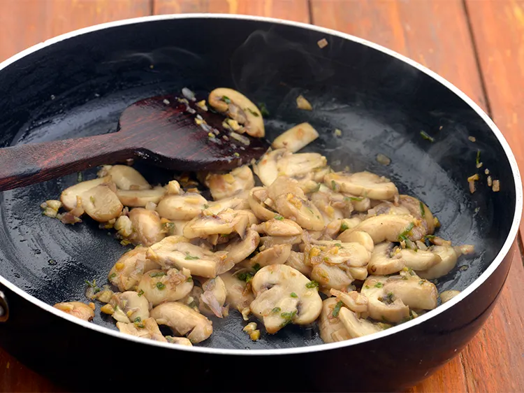 Step 27 – Add the mushrooms and little salt and mix well and cook on a medium flame …