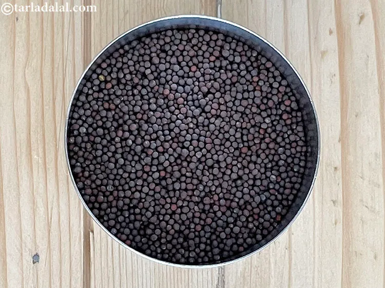 Step 6 – Add 1 tsp&nbsp;<a href="https://www.tarladalal.com/glossary-mustard-seeds-sarson-rai-sarson-ke-beej-525i">mustard seeds ( rai / sarson)</a>.&nbsp;