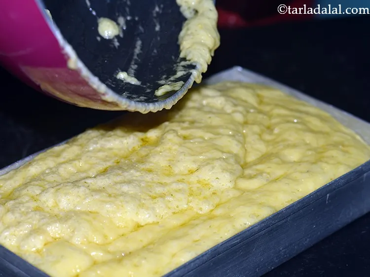 Step 17 – Once the consistency is reached, immediately transfer the mixture into the greased tin.