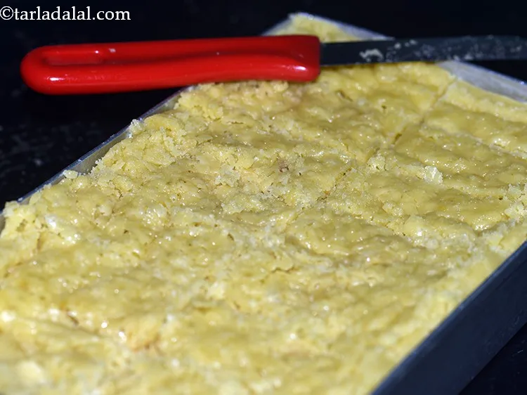 Step 21 – Leave it in the tin to cool completely at room temperature. This would take approximately …